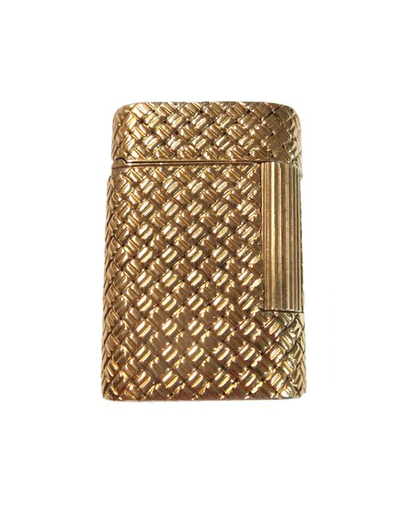 A Van Cleef & Arpels gold cased petrol lighter, of curved rectangular form, with simulated basket weave decoration, detailed VAN CLEEF & ARPELS NY 17V