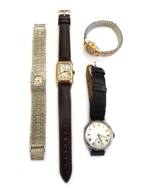 An Omega 9ct two colour gold, rectangular cased gentleman's wristwatch, the signed silvered dial with black baton numerals and with subsidiary seconds