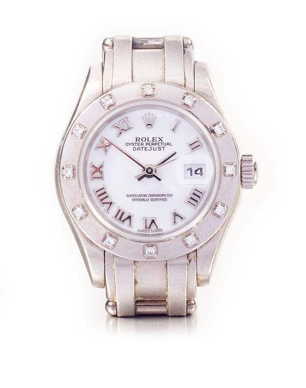 A Rolex Oyster Perpetual Datejust 18ct white gold and diamond set lady's bracelet wristwatch, the signed white dial with silvered Roman numerals, date