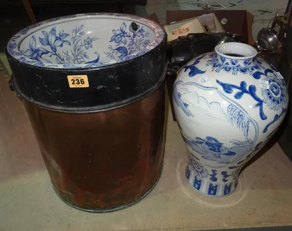 A 19th century copper and ceramic portable lavatory, transfer printed decoration, and a 20th century Asian blue and white vase, (2). S2B
