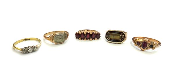 A George III gold, black and white enamelled and glazed locket mourning ring, detailed Ann Mackey Obt 7 Jany 1813 Aet 63, a gold and platinum, diamond