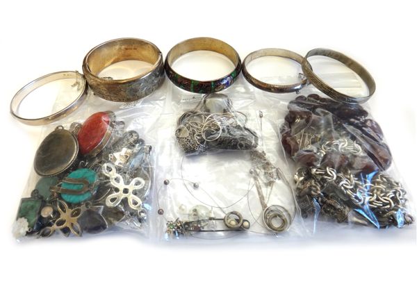 Silver and other jewellery, comprising; twenty-five pendants and charms, five bangles, a charm bracelet, three further bracelets, three brooches, two