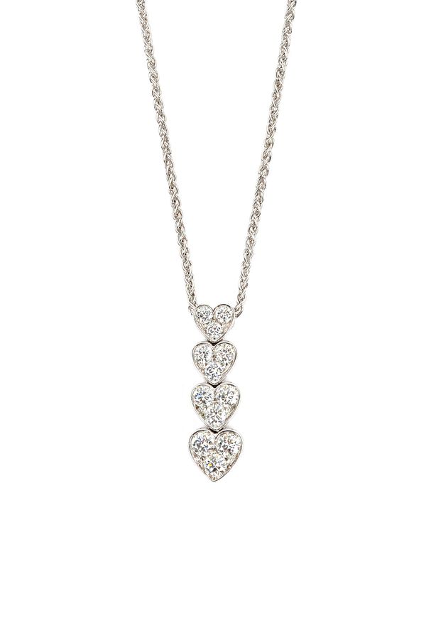 A white gold and diamond set pendant necklace, 2004, formed as a row of four graduated diamond set three stone heart shaped motifs, mounted with circu