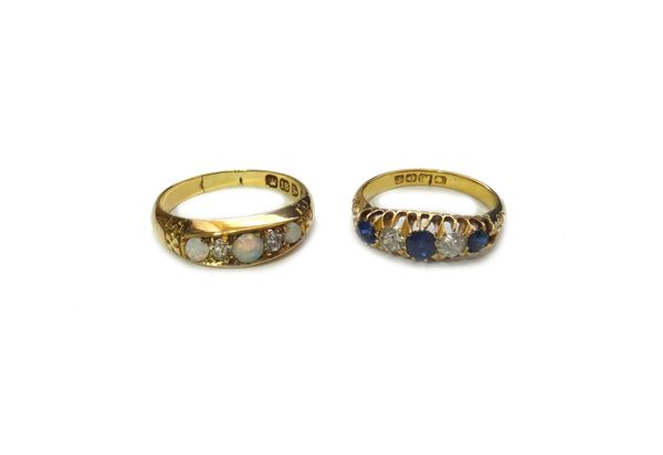 An 18ct gold, diamond and blue gem set five stone ring, Birmingham 1905, ring size M and a late Victorian 18ct gold, opal and diamond five stone ring,