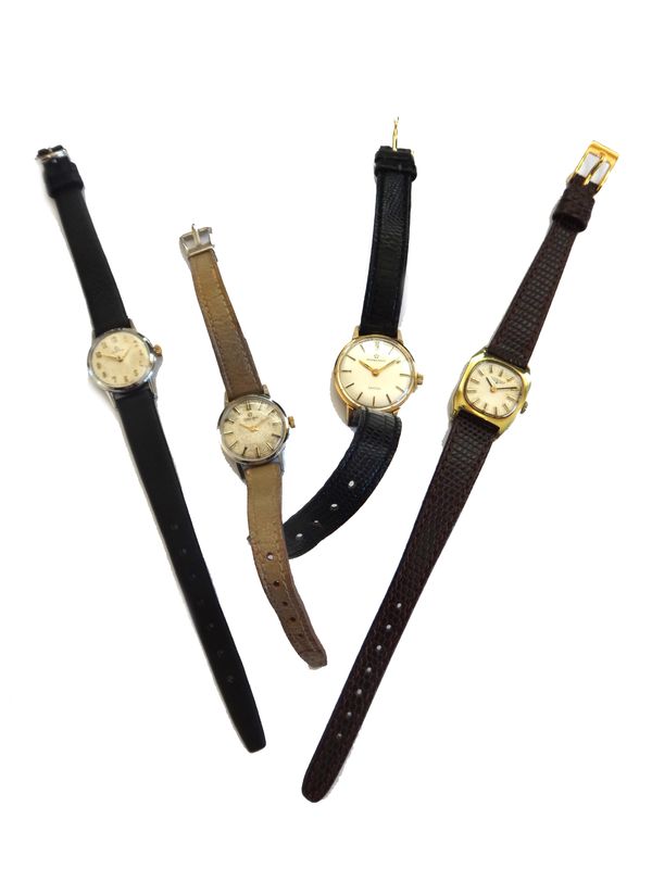 An Eterna Matic Sahida gold circular cased lady's wristwatch, the signed silvered dial with baton shaped numerals, two Omega lady's wristwatches, one