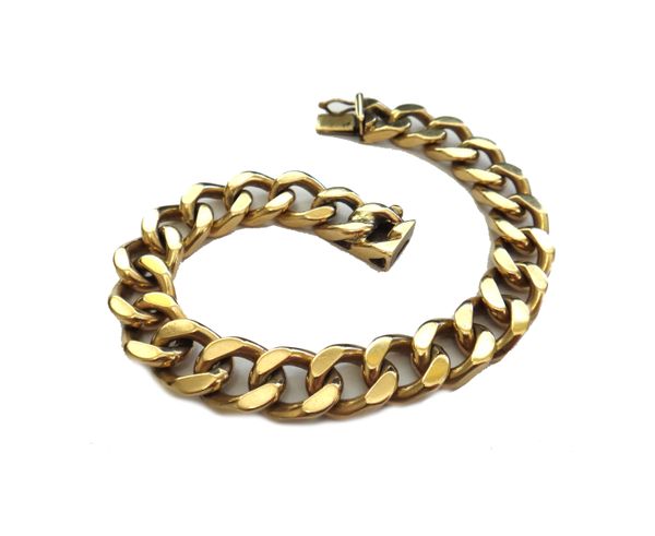 A 9ct gold faceted curb link bracelet, on a snap clasp with a fold over safety catch, Birmingham 1966, weight 55gms.