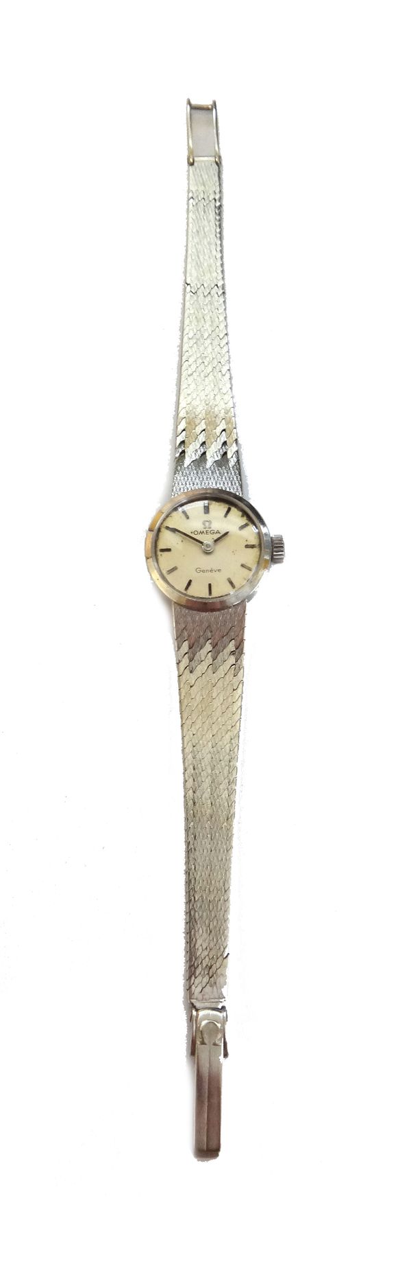 An Omega, white gold lady's bracelet wristwatch, the signed circular silvered dial with baton shaped numerals and with black hands, on a tapering wove