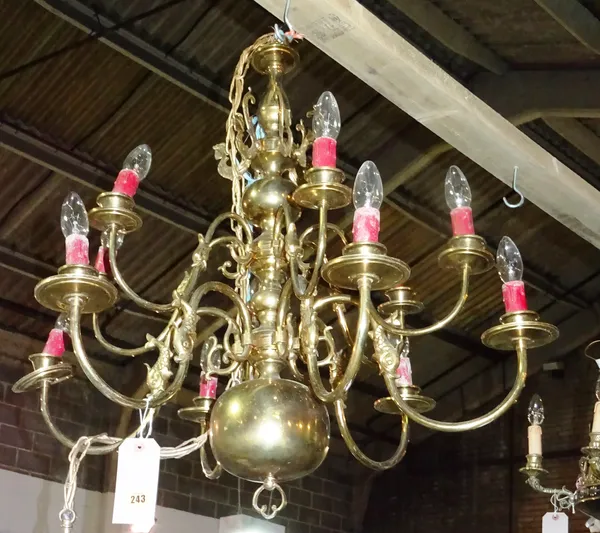 A 20th century brass twelve branch chandelier, with fish decoration.  HANG