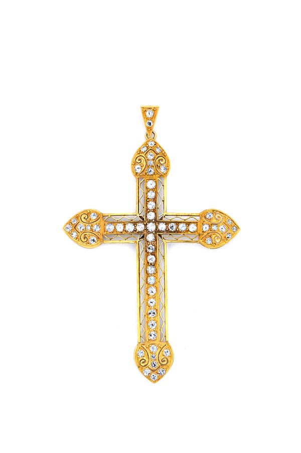 A gold plated on platinum diamond set pendant cross, with pierced decoration, mounted with circular cut diamonds, width 5cm, gross weight 10.5 gms, wi