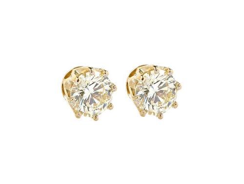 A pair of gold and diamond set single stone earstuds, each claw set with a circular cut diamond, the diamonds weigh approx 1.00 cts each, in a yellow