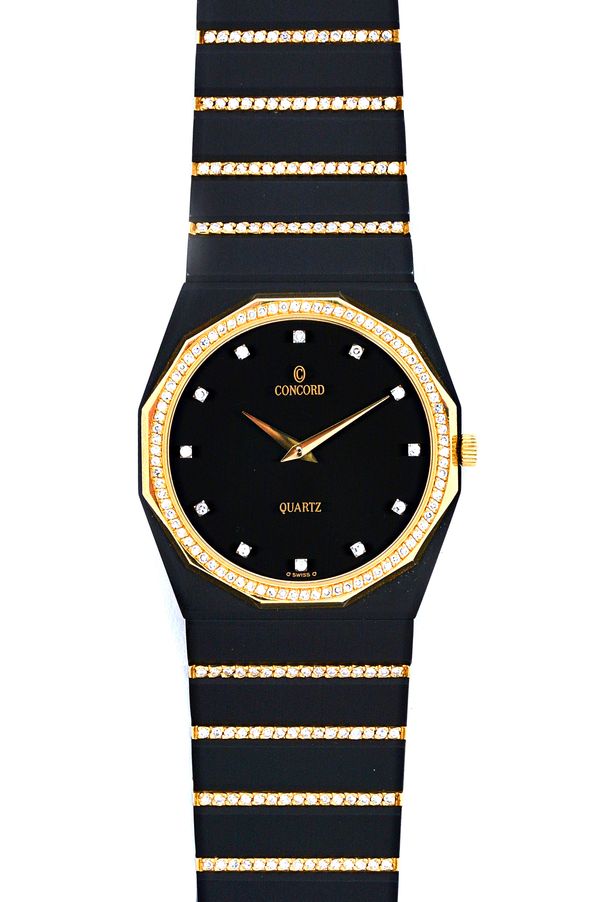 A Concord Quartz gold, diamond set and black patinated metal dress wristwatch, the signed circular black dial with diamond set numerals, the bezel sur