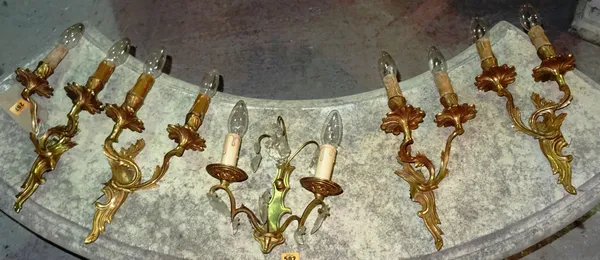 Lighting, including; a group of four 20th century gilt metal twin branch wall lights and another, (5).   C4