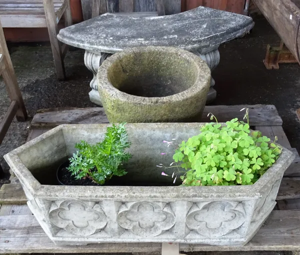 Reconstituted stone garden statuary, including; a 20th century Gothic style planter with quatrefoil decoration, 89cm wide x 34cm high, a semi-elliptic