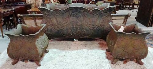 Garden statuary, including; an early 20th century cast iron rectangular planter of bombe form with floral decoration 57cm wide x 38cm high and a match