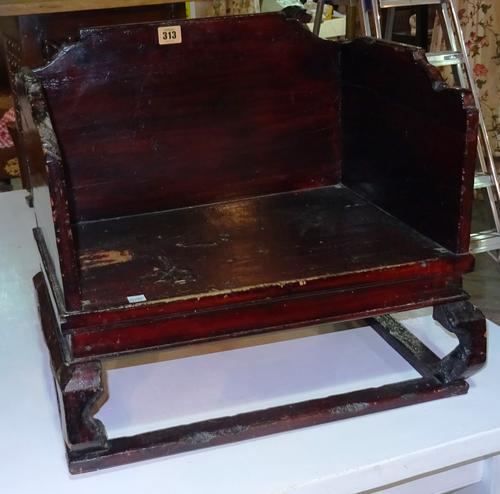 An early 20th century Asian red lacquer shrine stand, 48cm wide.   B10