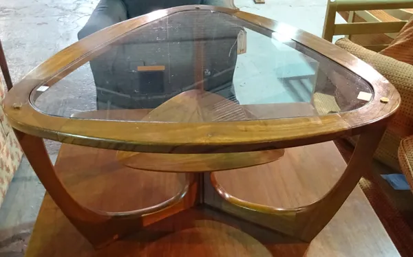 A 20th century Danish teak triangular shape glass top coffee table, 80cm wide.  I9