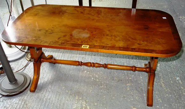 A 20th century yew coffee table in the form of a Regency centre table, 90cm wide x 43cm high.   D4