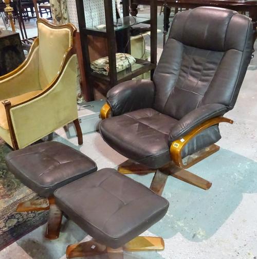 A 20th century faux leather reclining open armchair with two matching footstools, (3).  I5
