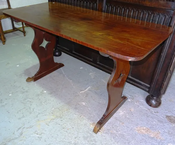 A 19th century mahogany campaign style side table on silhouette dual end supports, 137cm wide x 78cm high. 5.6  M7
