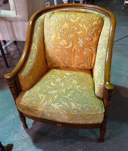 A 20th century mahogany framed tub back armchair, with studded upholstery.  D3