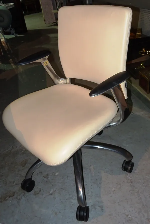 'Verco', a 20th century chrome office swivel chair, with faux white leather upholstery.  M1