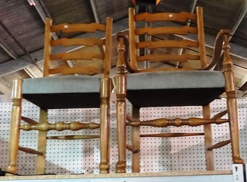 A set of six 20th century oak ladder back dining chairs, to include two carvers, (6).  M3