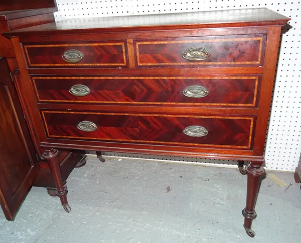 An Edwardian mahogany and satinwood crossbanded dressing table on tapering turned supports, 92cm wide x 84cm high. 4.2  G10