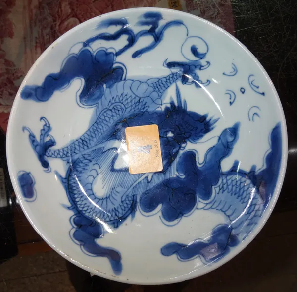 A small Chinese blue and white dragon dish, 18th/19th century.  CAB