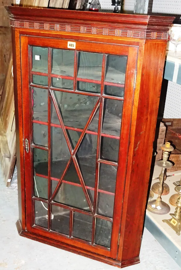 A 19th century mahogany glazed corner cabinet, 66cm wide x 104cm high.  A5