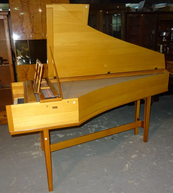 A 20th century beech framed harpsichord and stand, 84 cm wide x 195cm long 85cm high.   K9