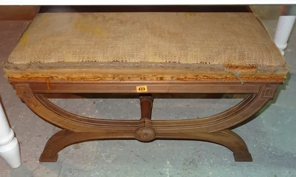 An Edwardian mahogany 'X' frame footstool, with turned stretcher, 83cm wide x 42cm high.  F7