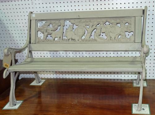 A 20th century grey painted cast iron child's garden bench, 80cm wide.  C10