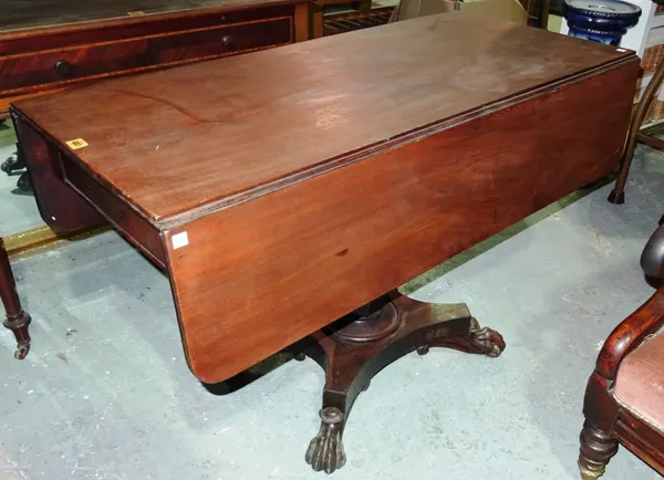 A Victorian rosewood sofa table, on octagonal turned central column and claw feet, 112cm wide x 72cm high.  J3
