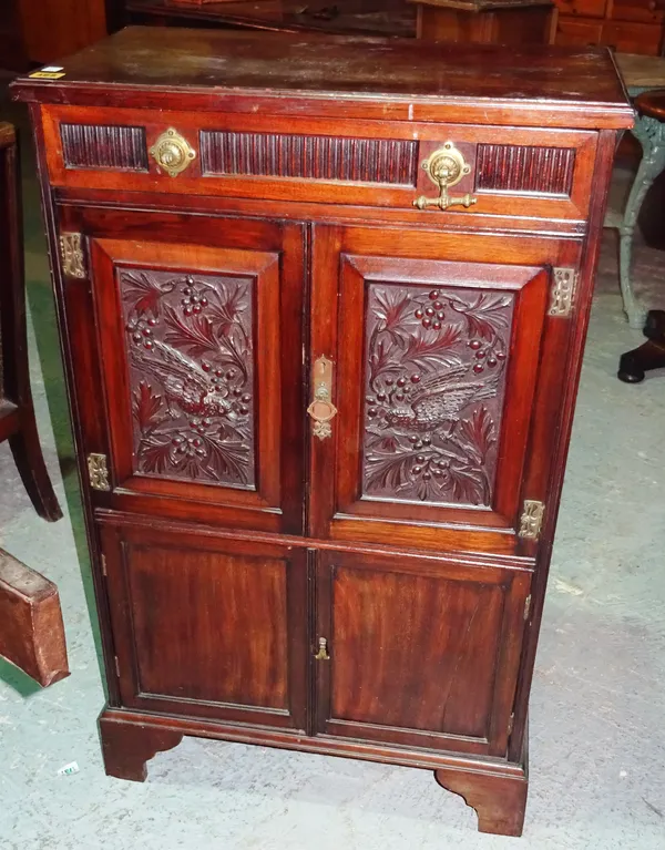 A late Victorian rosewood side cabinet, with carved inset panel doors, on bracket feet, 62cm wide x 100cm high.  K7