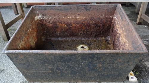 An early 20th century rectangular cast iron planter, with twin loop handles, 54cm wide x 30cm high x 48cm deep.  OUT