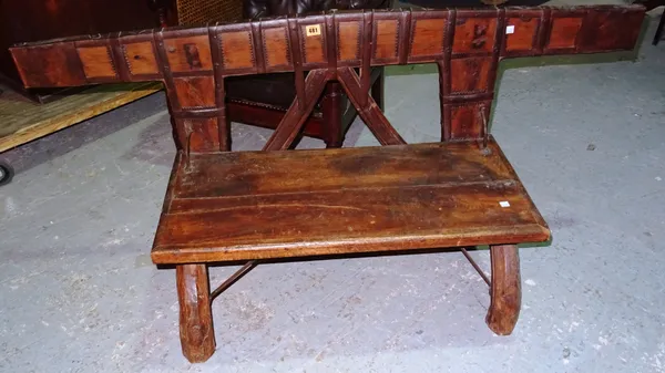A 20th century Indian hardwood and metal bench, 146cm wide x 66cm high.  J5
