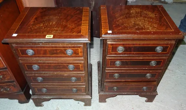 A pair of 20th century mahogany bedside chests of four drawers, on bracket feet, 41cm wide x 61cm high, (2).  I5