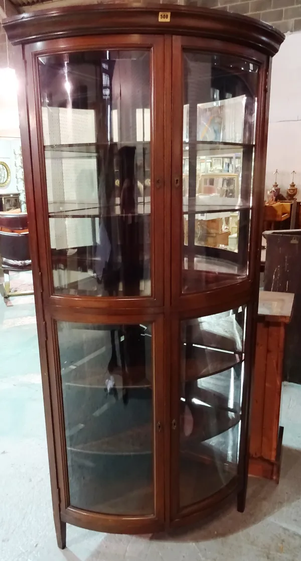 A 20th century mahogany corner display cabinet, on tapering square supports, 85cm wide x 191cm high.  M6