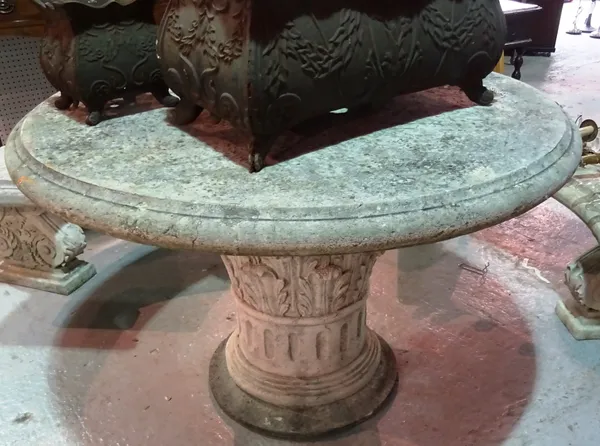 A 20th century faux stone circular garden table with acanthus moulded pedestal base, 115cm wide x 80cm high.  C5
