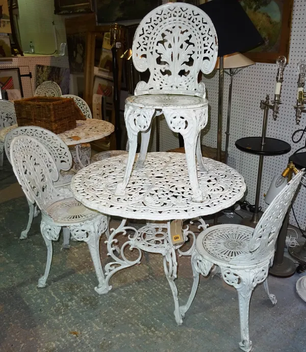 A 20th century white painted metal garden table, 91cm wide x 69cm high and a set of three cast iron white painted chairs, (4).  B7