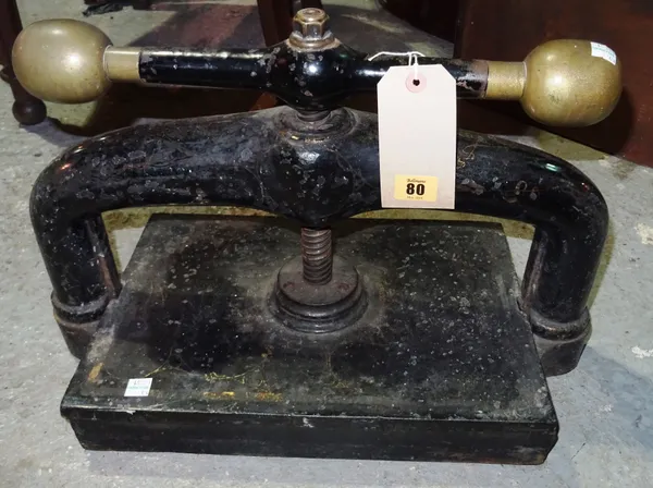 A 19th century cast iron book press.  J3