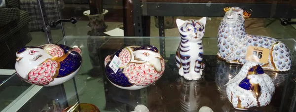 Five Royal Crown Derby Imari paperweights, each with a gold button to the base, comprising; a ram, two partridges, a cat and a lamb group, (5).  CAB