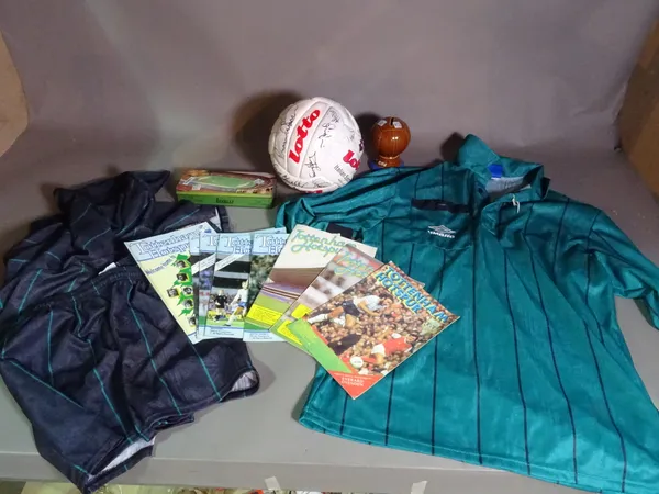 Sporting interest, including a quantity of Tottenham Hotspur programmes, a football kit, a money box, a signed football and sundry, (qty).   S4B