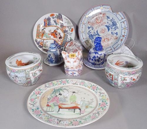 Asian ceramics including oval Japanese plate decorated with figures, Imari type Japanese plates, a pair of 20th century Chinese fish bowl jardinieres,