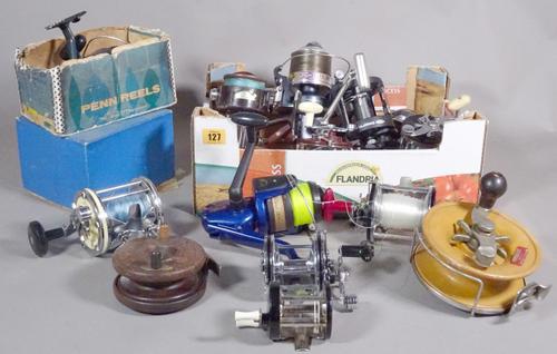 A box of sea fishing reels for shore and boat fishing to include Penn, Mitchell and Daiwa. (qty)  S3B