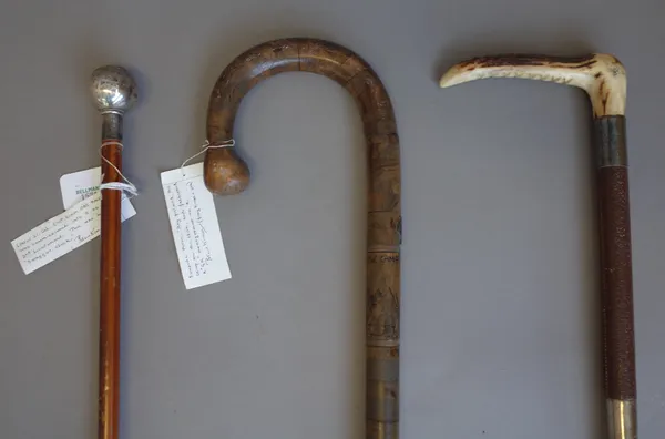 A Maltese prisoner of war walking stick, WWI period, made of segmented hardwood, painted with the prison camp and monogrammed 'G.K.' with attached pro