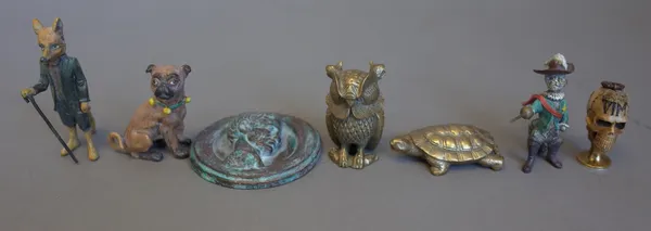 A group of small collectables, including; six cold painted bronze figures, a carved bone 'skull seal', two brass miniature icons, 'Votes for Women' wh