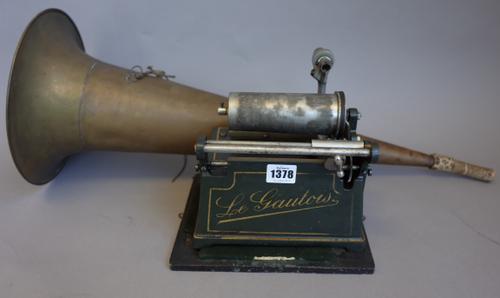A French 'Le Gaulois' phonograph with large brass horn and a quantity of cylinders, (key and case).