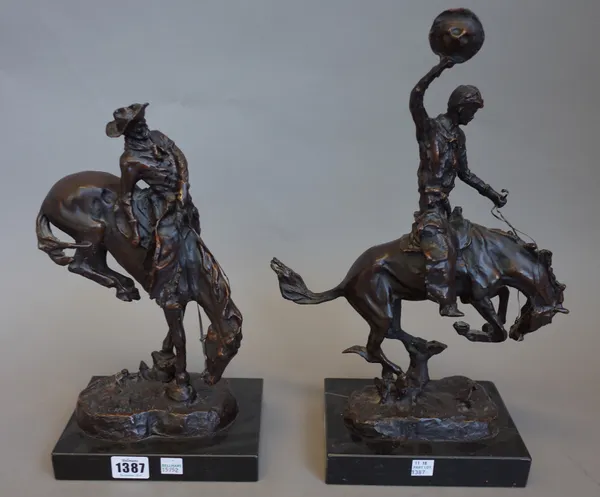 After Frederic Remington (1861-1909) 'The Outlaw', a reproduction bronze on marble plinth (31cm high), another reproduction bronze 'Cowboy on Horsebac