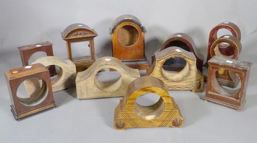 A large quantity of mainly mahogany late 19th and early 20th century mantel clock cases, (qty). S2T